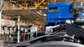 Automobile assembly line production at the Kamaz truck factory. Scene. Time lapse effect, industrial background with