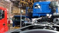 Automobile assembly line production at the Kamaz truck factory. Scene. Time lapse effect, industrial background with