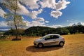 Automobile in brown field