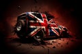 Automobile car with Union Jack paintwork which is the national flag of the United Kingdom, destroyed by a vehicle explosion Royalty Free Stock Photo