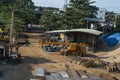 Automobile crane with risen telescopic boom outdoors. Mobile construction crane on a constructin site. Crane machine Royalty Free Stock Photo