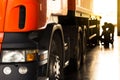 Automobile mechanic checking truck in the garage in the moning with sumbeam, selective focus Royalty Free Stock Photo