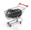 Automobile wheels and shopping cart. Royalty Free Stock Photo