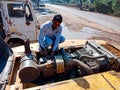 automobile workers repairing hydraulic engine at workshop in india dec 2019 Royalty Free Stock Photo