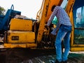 automobile workers repairing hydraulic machine at workshop in india dec 2019 Royalty Free Stock Photo