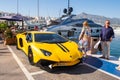 Automobili Lamborghini. Luxury cars parked next to yachts in the marina of Estepona, Malaga,