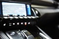 Automotive detail in a luxury car. Modern Luxury car inside. Interior of prestige modern car. Automatic gear stick shift