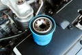 Automotive oil filter on engine bay Royalty Free Stock Photo