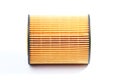 Automotive oil filter on a white background. High quality yellow filter element. Royalty Free Stock Photo
