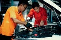 Automotive service mechanic inspect and diagnose car engine. Oxus