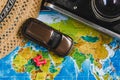 Automotive Travel Destination Points on World Map Indicated with Colorful Thumbtacks, Rope and Shallow Depth of Field. Royalty Free Stock Photo