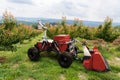 Autonomous agricultural robot with robotic arm.