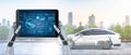 Autonomous car maintenance with robot hold digital tablet with electric car user interface