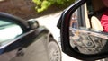 Autonomous cars on a road with visible connection. Blind Spot Monitoring system warning light icon in side view mirror