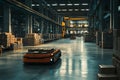 Autonomous mobile robot navigating a large warehouse filled with stacked boxes Royalty Free Stock Photo