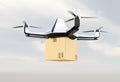 Autonomous unmanned drone delivering cardboard box in the sky