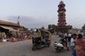 Autorickshaws running at busy and congested famous Sardar Market and Ghanta ghar Clock tower in Jodhpur, Rajasthan, India
