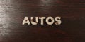 Autos - grungy wooden headline on Maple - 3D rendered royalty free stock image