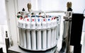 Autosampler of NMR spectrometer loaded with samples for analysis Royalty Free Stock Photo