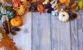 Autumn Background with leaves, pumpkins, and gourds. Royalty Free Stock Photo