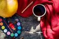 Autumn aesthetic still life: fruits, vegetables and bright paints with a cinnamon sticks, viburnum, flower petals and Royalty Free Stock Photo