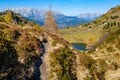 Autumn alpine Grosser Paarsee or Paarseen lake, Land Salzburg, Austria. Alps Hochkonig rocky mountain group view in far Royalty Free Stock Photo