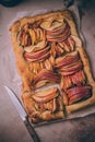 Autumn apple puff pastry tart with cinnamon spice and honey drizzle. Comfort Fall baking food Royalty Free Stock Photo
