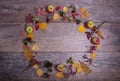 Autumn arrangement of leaves, apples and berries on a wooden background with free space for text. Top view, concept of Royalty Free Stock Photo