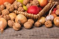 Autumn arrangement of vegetables and fruits lying on old wooden boards. Front view. Royalty Free Stock Photo