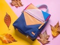 Autumn back to school concept ai generated image of backpack on bright background with copy space Royalty Free Stock Photo
