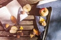 Autumn background with book, plaid, cookies, yellow leaves and apples