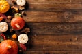 Autumn background with colorful pumpkins, berries, fall leaves, walnuts on wooden table. Thanksgiving, Halloween, Autumn, Harvest Royalty Free Stock Photo