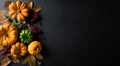 Autumn background decor from dry leaves and pumpkin on blackboard background. Flat lay, top view with copy space for Autumn, fall Royalty Free Stock Photo