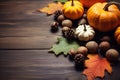 Autumn background from fallen leaves and fruits with vintage place setting on old wooden table. Thanksgiving day concept