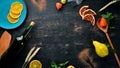 Autumn background food. Wine, dried fruits, spices. On a wooden background.