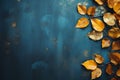 Autumn Background with golden leaves against a serene blue backdrop