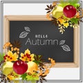 Autumn floral background with Hello Autumn text on blackboard
