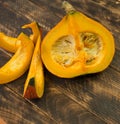 Autumn background with pumpkin on wooden board