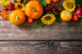 Pumpkins, sunflowers, apples and fallen leaves. Top view flat lay. Copy space Royalty Free Stock Photo