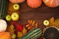 Autumn background with vegetables on wooden surface Royalty Free Stock Photo