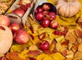 Autumn background from yellow leaves, apples, pumpkin. Fall season, eco food and harvest concept Royalty Free Stock Photo