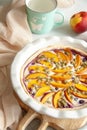 Pie with peach, blueberry and pumpkin seeds