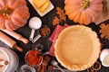 Autumn baking table scene with pumpkin pie ingredients Royalty Free Stock Photo