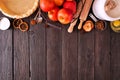 Autumn baking top border with apple pie ingredients over a dark wood background