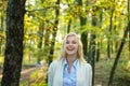 Autumn Beauty. Sweet young sensual sexy woman walking in autumn park. Autumnal mood. Cheerful carefree autumn woman in Royalty Free Stock Photo