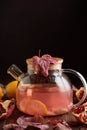 Autumn Beverage: Pomegranate Tea with Lemon and Ginger on Rustic Table Royalty Free Stock Photo