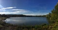 Autumn blue skies above Westport Lake. Royalty Free Stock Photo