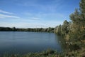 Autumn blue skies above Westport Lake. Royalty Free Stock Photo