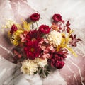 Autumn bouquet dahlias flowers in red, burgundy colors on marble background. Royalty Free Stock Photo