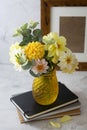 Autumn bouquet with fresh dahlia flowers, notebooks, work space Royalty Free Stock Photo